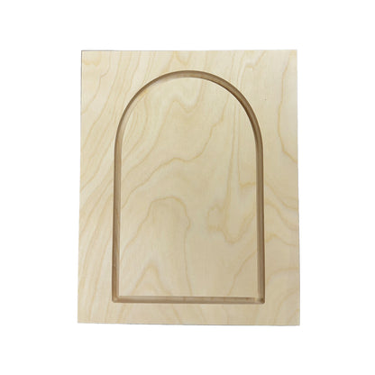 a wood canvas with an arch shape