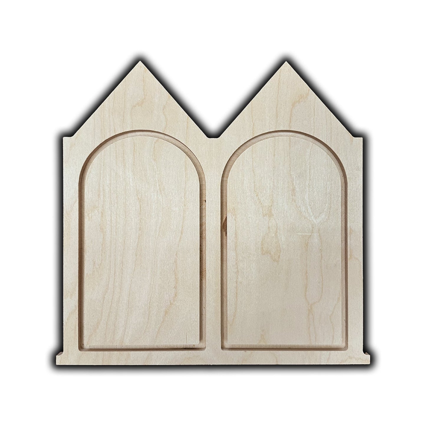 a wood canvas that looks like a house with two arches