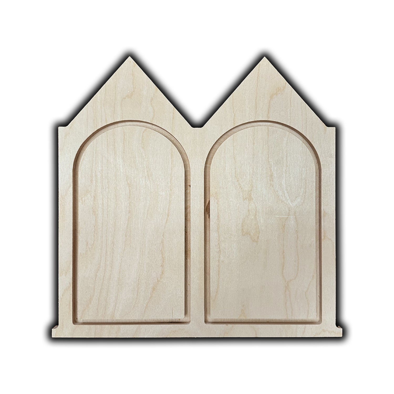 a wood canvas that looks like a house with two arches